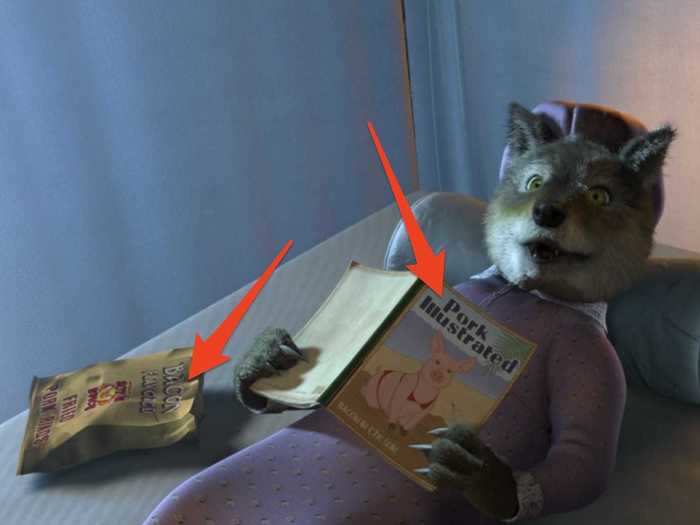 The Big Bad Wolf is reading "Pork Illustrated" and eating bacon-flavored pork rinds.