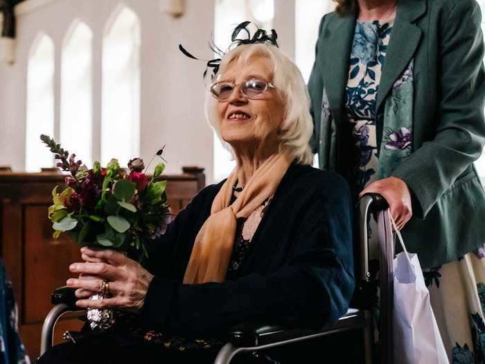 Both grandmothers use wheelchairs, but one of them was able to walk with a cane and support during the wedding.