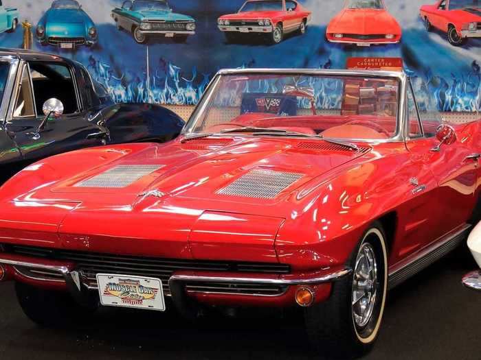 This is a red 1963 Chevrolet Corvette convertible.