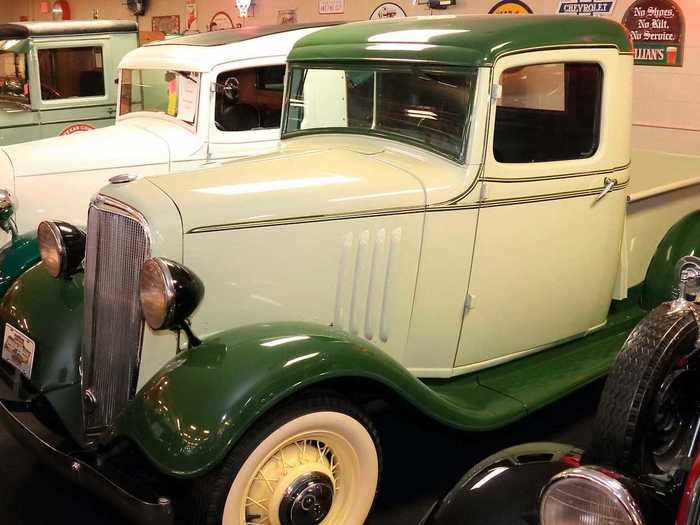 This 1935 Chevrolet pickup has a two-tone green exterior.