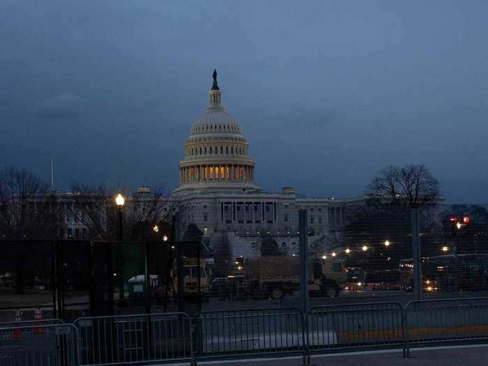 President-elect Biden plans to be sworn in on the steps of the Capitol, as is customary. US flags can be seen hanging from the building ahead of Biden