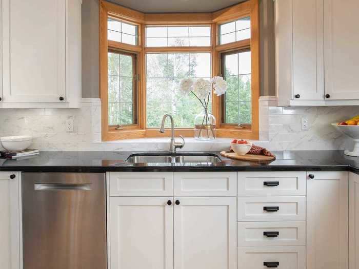 Monochrome kitchens seem to be falling out of fashion.