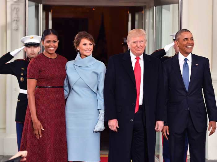 January 20, 2017: Melania Trump greeted the Obamas at the White House on Inauguration Day with the president-elect in a powder blue mock-turtleneck suit.