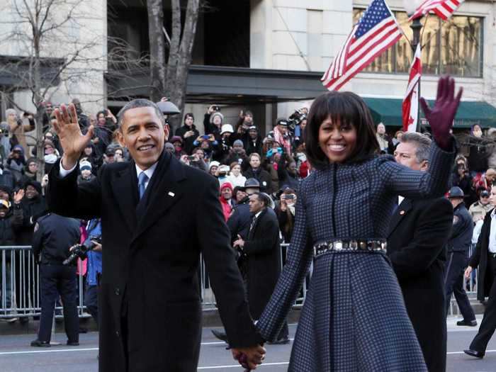 January 21, 2013: Michelle Obama wore a collarless blue-checkered coat with J. Crew shoes to President Obama