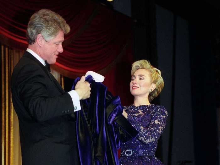 January 20, 1993: Hillary Clinton wore a violet beaded lace sheath gown with a blue velvet silk overskirt to the inaugural balls.