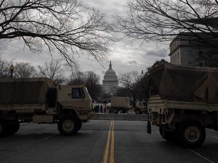 Guard trucks at the inner perimeter in front of the Teamsters building.