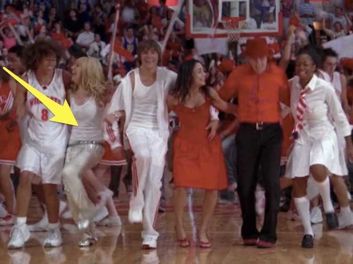 Though Sharpay usually wears pink, she matches with the rest of her classmates for the final song.