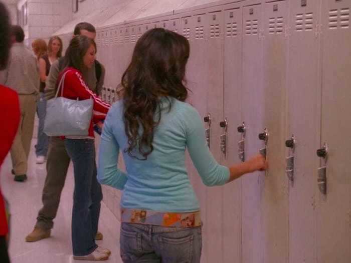 Gabriella opens her locker without actually unlocking it.