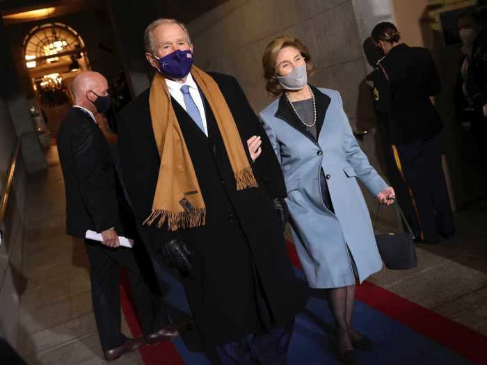 Former First Lady Laura Bush was twinning with Jill Biden in a baby-blue coat.