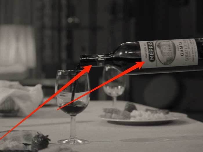 Take a close look at the wine bottle seen on the premiere.