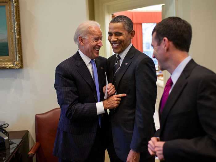 They shared a laugh with senior adviser David Plouffe in 2012.