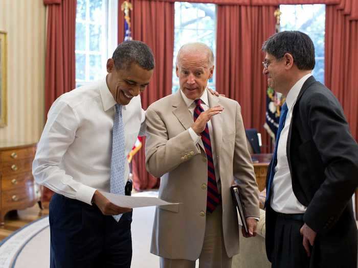 Obama cracked a smile as he spoke with Biden and Chief of Staff Jack Lew in the Oval Office in 2012.