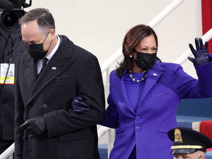 Kamala Harris was sworn in as vice president wearing an all-purple outfit that may have symbolized bipartisanship.