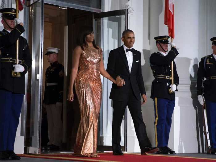 Michelle Obama may have sent a message of female empowerment with an armor-inspired Versace gown in 2016.