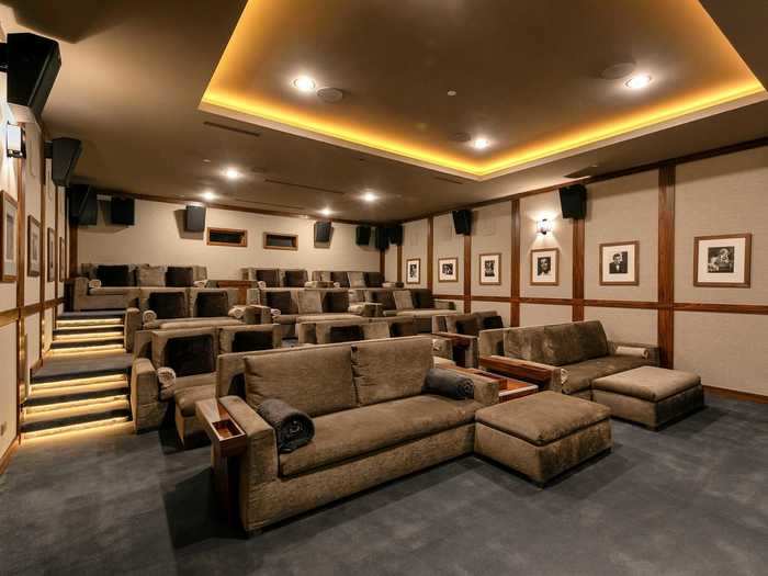 The spacious media room has plenty of seating.