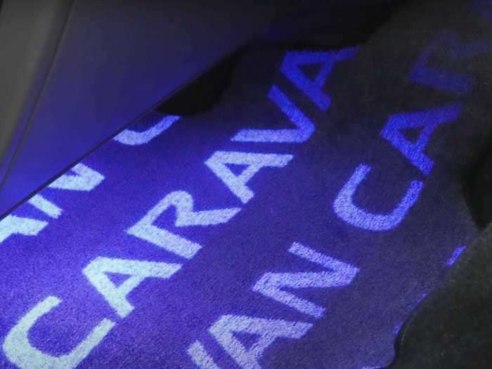 When a black light hits the carpeted floor mats, a pattern of the word "caravan" is revealed.