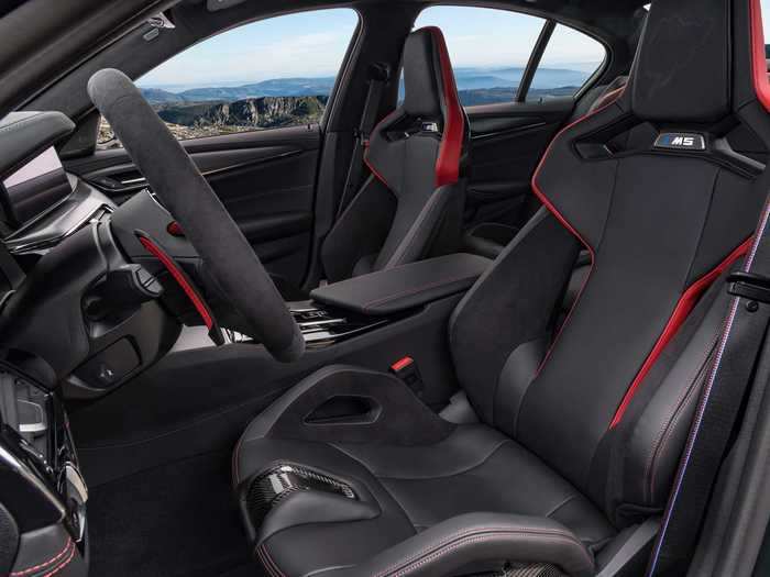 Instead, there are two M carbon sport seats for the front passengers.