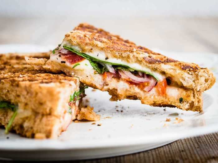 Tomato slices are a fan-favorite addition to grilled cheese sandwiches.