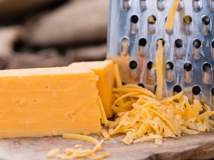 Grated cheese will allow for optimal meltage.