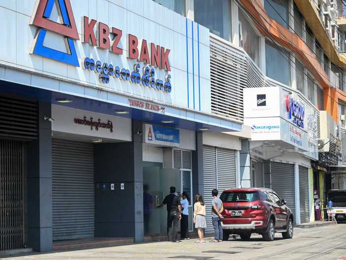 As news of the coup spread, citizens lined up at banks to pull their money out before access to their accounts was frozen.