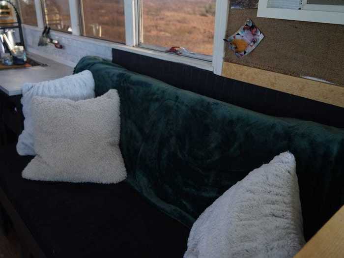 AFTER: They replaced the couch with one that transforms into a bed.