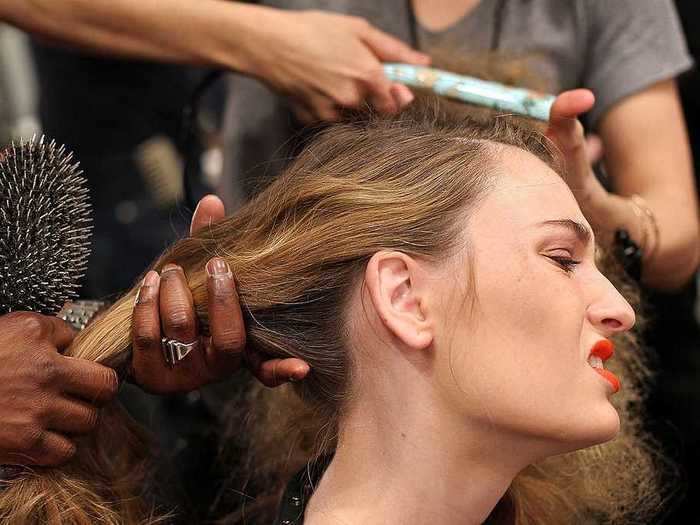 Models have to sit through the hair pulling with no complaints.