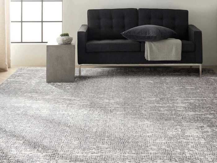 Transform your space by adding a neutral rug.