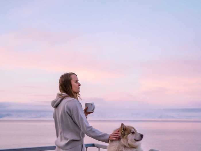 The first thing she does is feed her dog, Grim, who gets to play outside for a little bit, before making herself a cup of coffee.