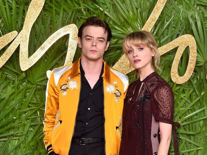 "Stranger Things" stars Charlie Heaton and Natalia Dyer wore whimsical outfits to the 2017 Fashion Awards.