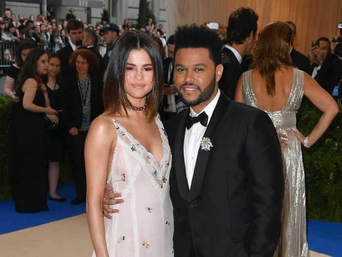 Selena Gomez and The Weeknd opted for contrasting looks at the same event.