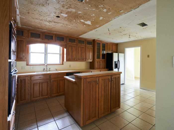 The kitchen was dark, small, and in disrepair before Chip and Joanna updated it.