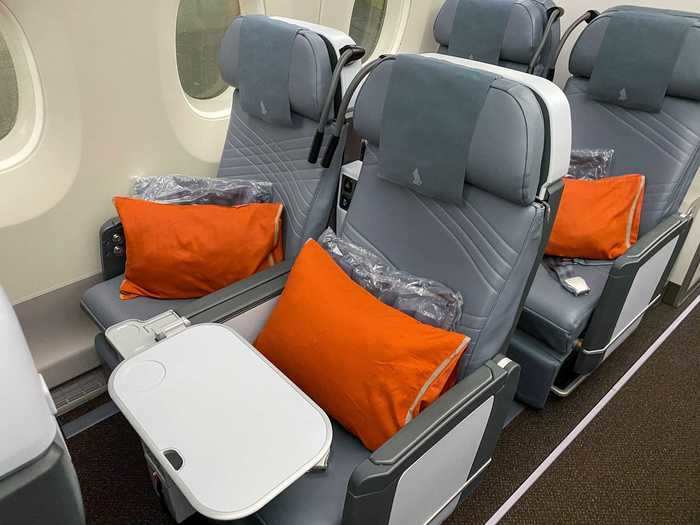 These recliner seats are comparable to first class seats on a domestic flight, in size and pitch.