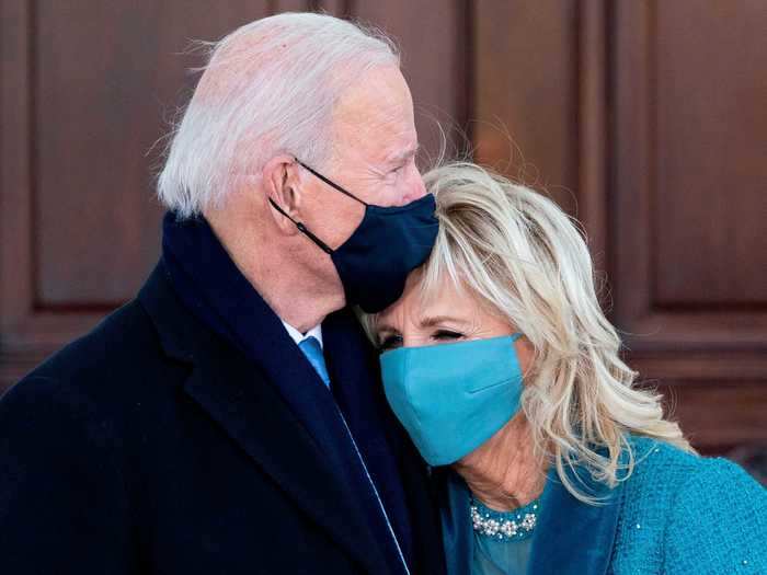 Joe gave Jill a masked kiss on the forehead as they arrived at the White House.