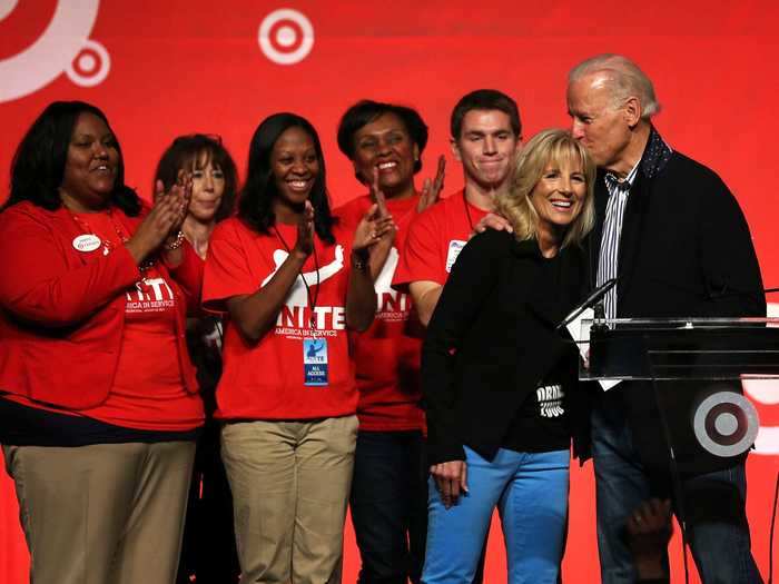 Joe gave Jill a peck at an event packing care kits for members of the US military, veterans, and first responders in January 2013.