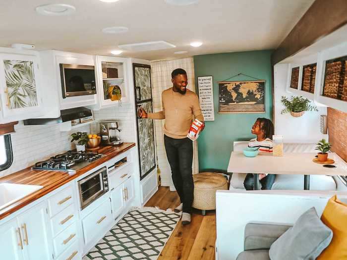 The RV consists of three distinct spaces: the living area, Aiden