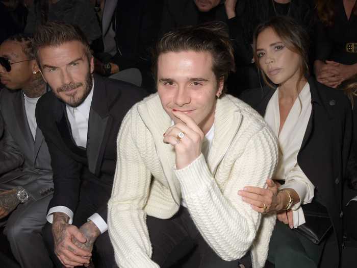 Professional English footballer David Beckham and former Spice Girl Victoria Beckham have modeled over the years. Their son, Brooklyn Beckham, is following in their footsteps.