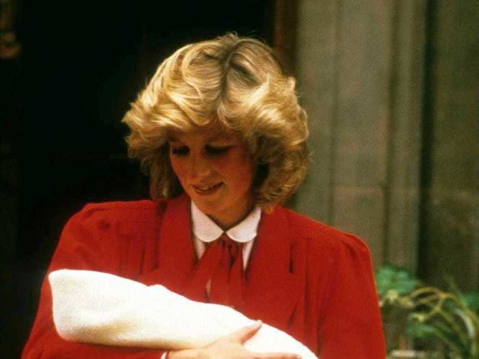 1984: Prince Henry Charles Albert David - AKA Prince Harry - was born on September 15. In this photo, Princess Diana holds him for photographs on the steps outside the Lindo Wing at St Mary