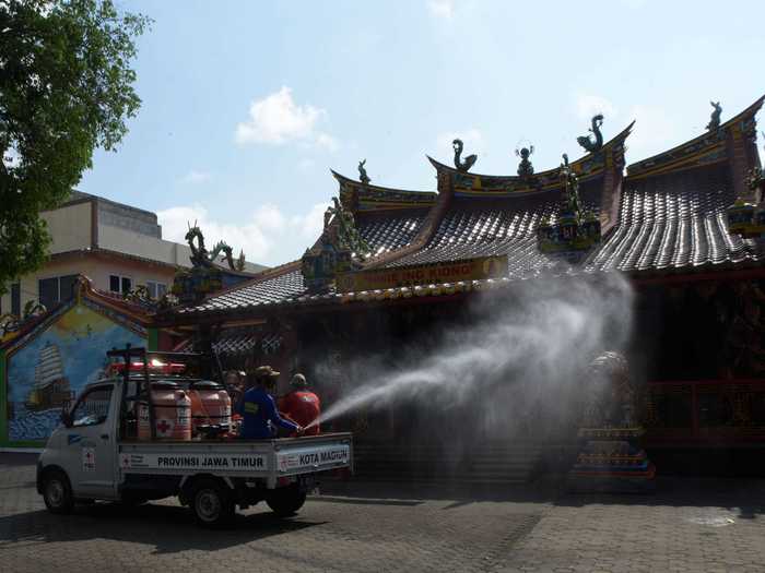 Temples are hosed down with disinfectant.