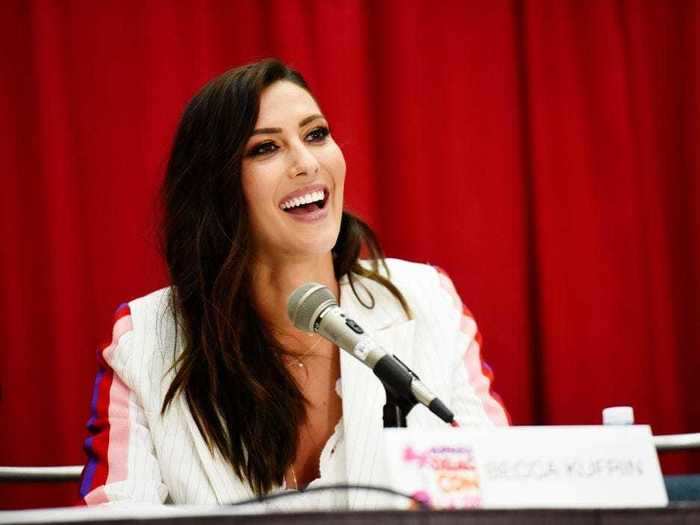 Becca Kufrin is the other co-host of "Bachelor Happy Hour" and the "Bachelor Live Tour."