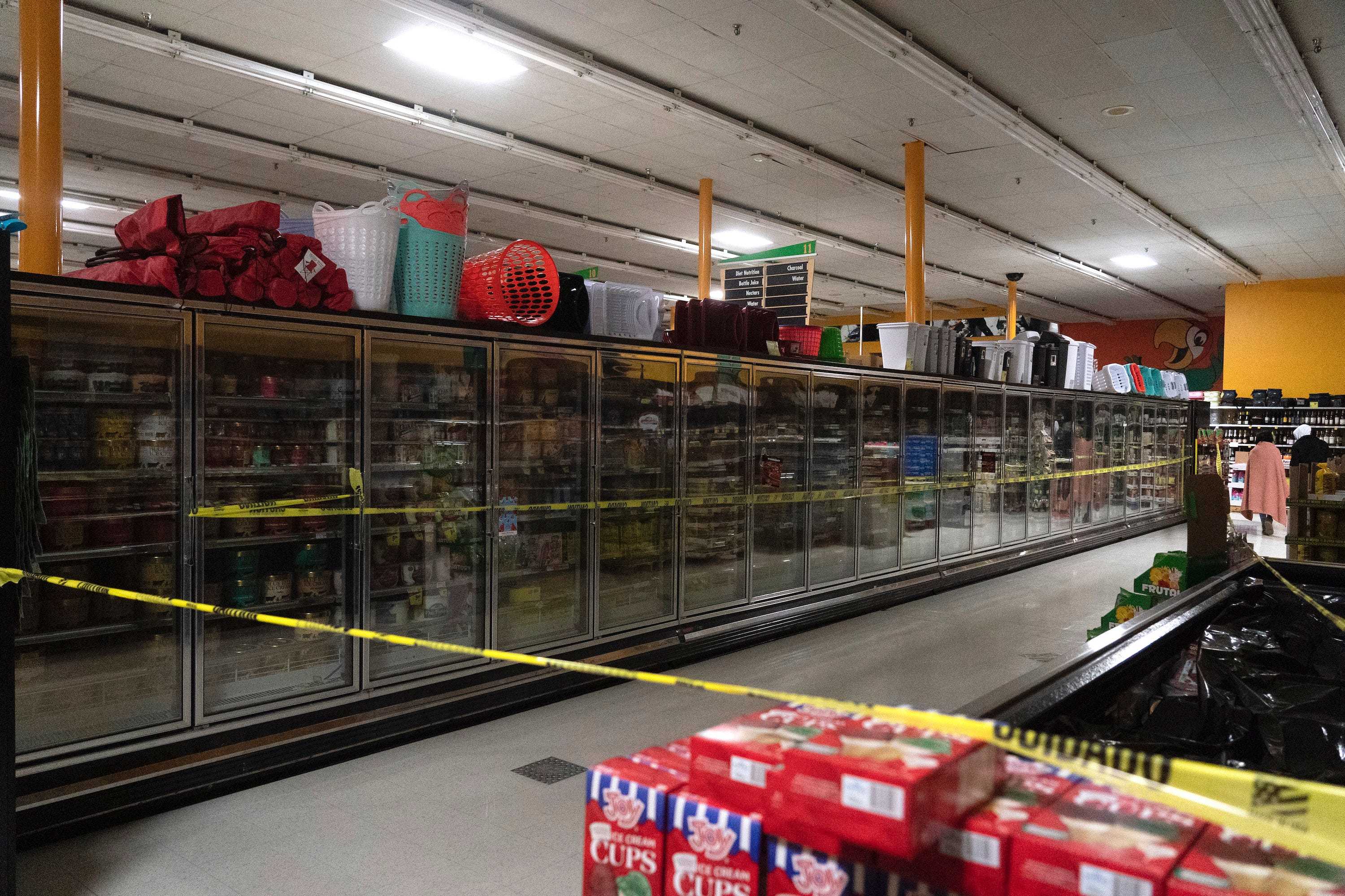 Freezer sections are closed off in Fiesta supermarket on February 16, 2021 in Houston, Texas.