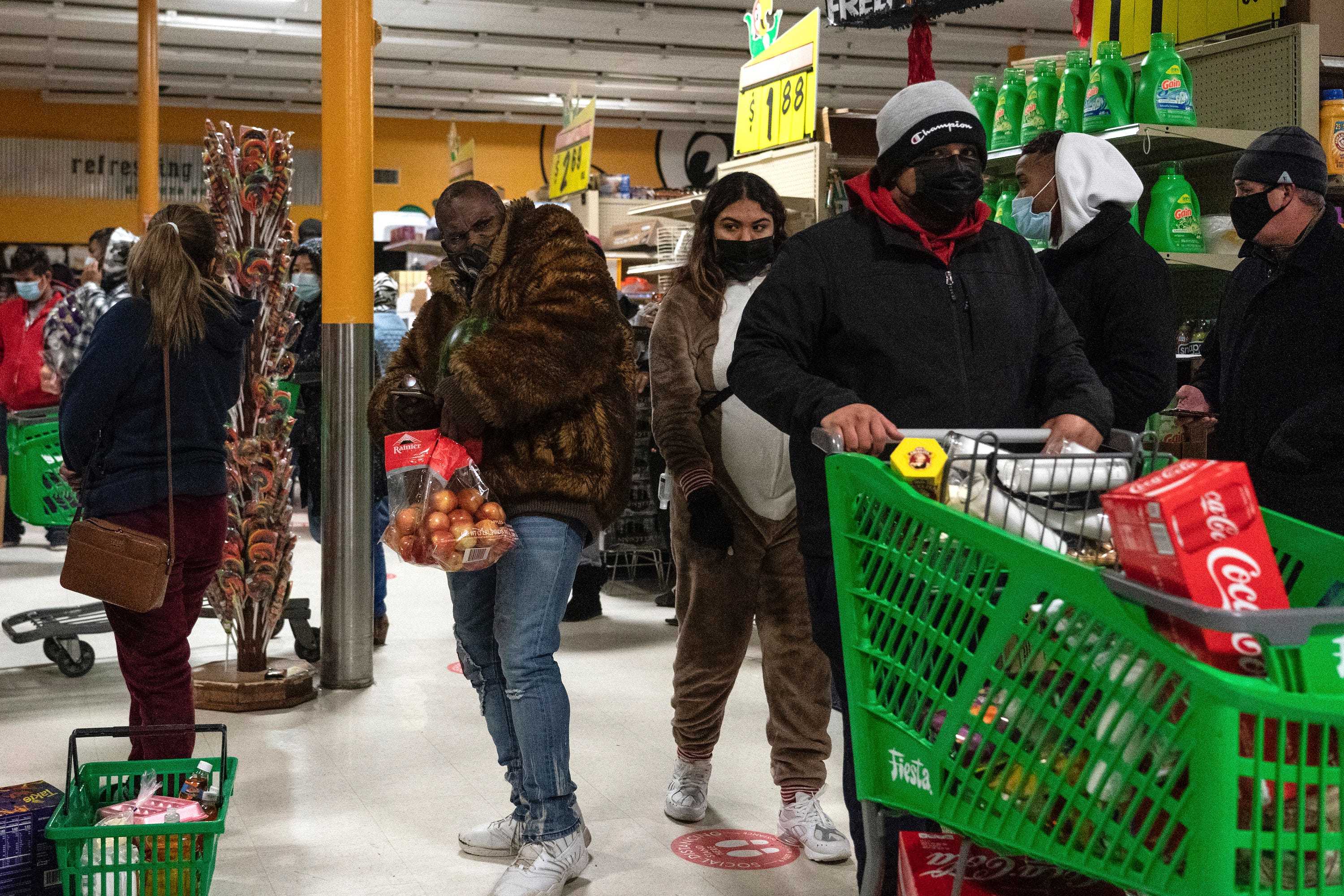 People shop in Fiesta supermarket on February 16, 2021 in Houston, Texas. Winter storm Uri has brought historic cold weather, power outages and traffic accidents to Texas as storms have swept across 26 states with a mix of freezing temperatures and precipitation.