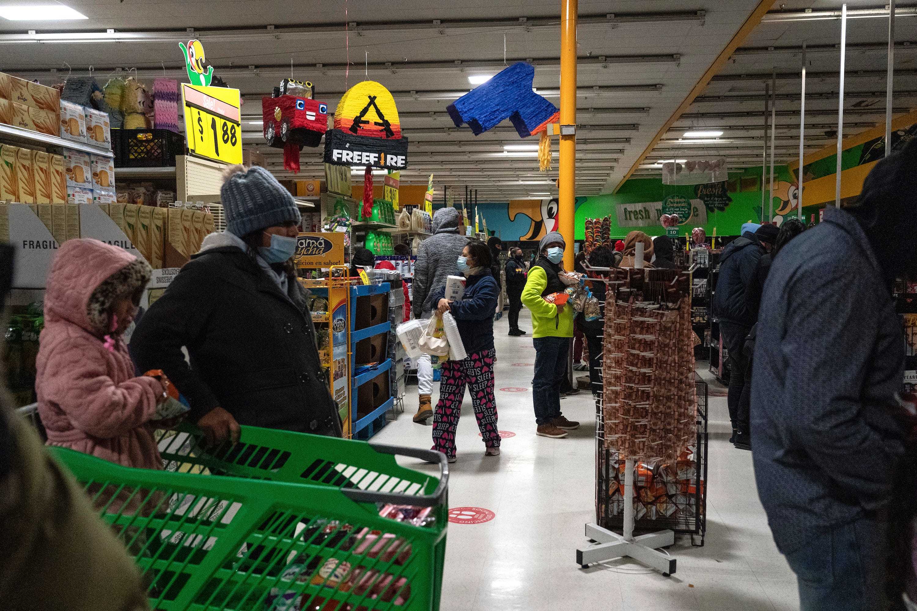 People shop in Fiesta supermarket on February 16, 2021 in Houston, Texas.