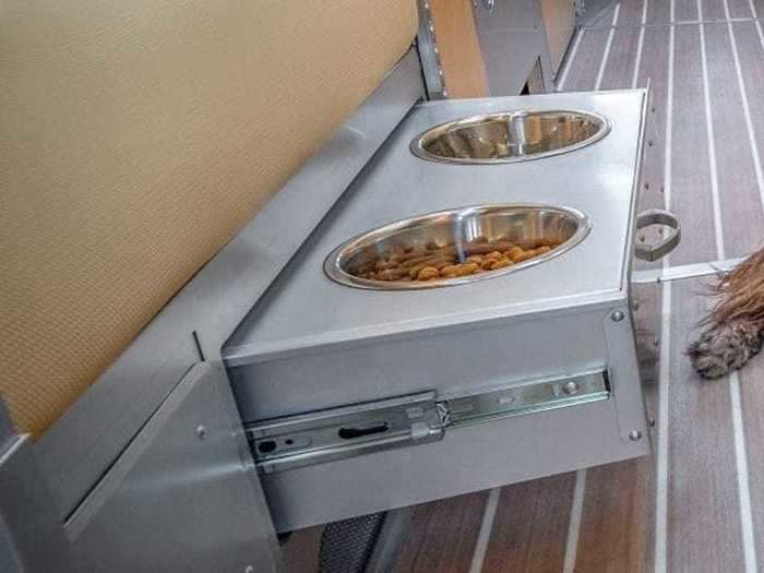 The unit also has several features designed to appease any traveling pet, such as a dog bed and a designated drawer that holds the water and food bowls.