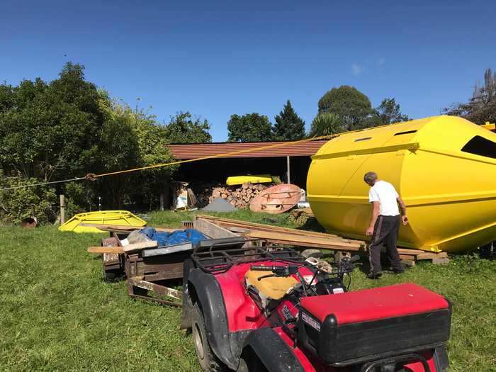 Once the spare parts were painted, he rolled the silo onto the bed of a tractor to transport it to its final destination: a patch of redwood trees in front of the house.