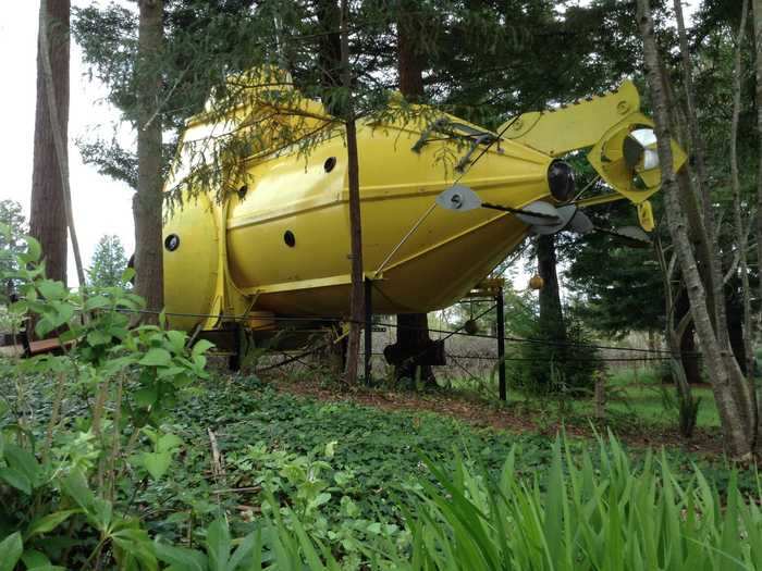 Measuring 33 feet long and 16 feet high, the tiny home is made entirely from upcycled materials.