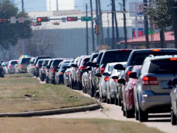 One Houston water distribution site saw massive lines Friday.