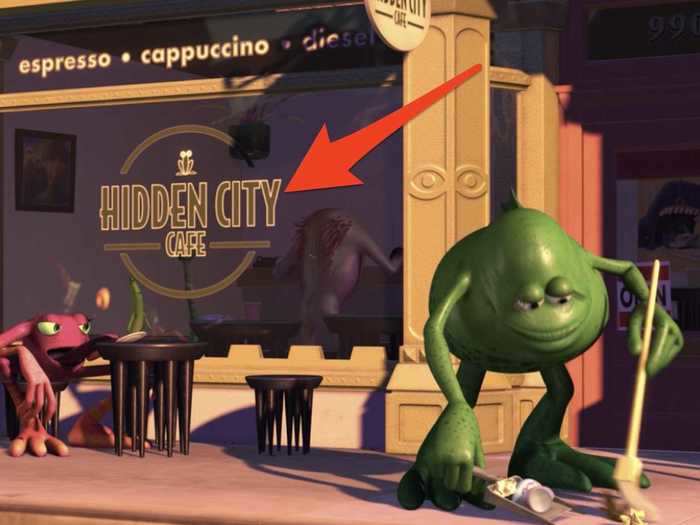 Mike and Sulley pass a café with a recognizable name.