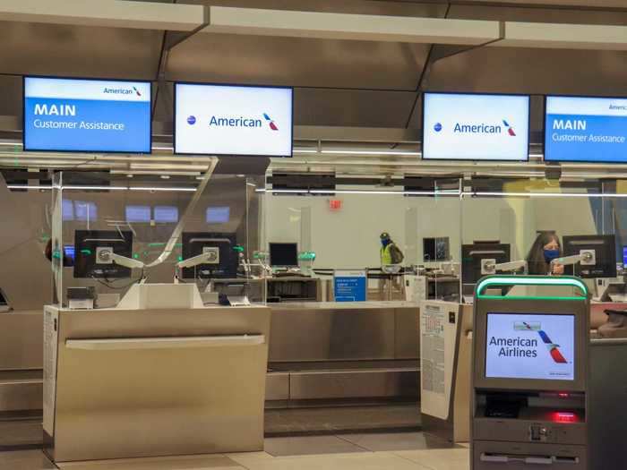 Check-in at LaGuardia Airport was filled with social distancing measures including plexiglass partitions at ticket counters and spaced kiosks. The same can be found at airports across American