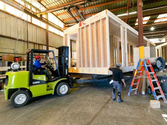 Once the homes are ready, they can be shipped to its final destination and set in place using a crane.