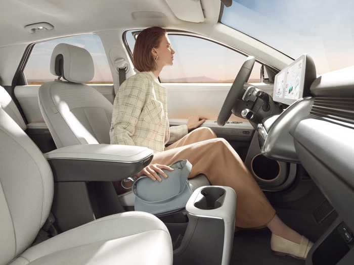 That center console is called the Universal Island, which can slide back by as much as 5.5 inches.